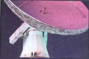 We talk, see, and listen with large dishes. Earth station, U.K., 1982.
